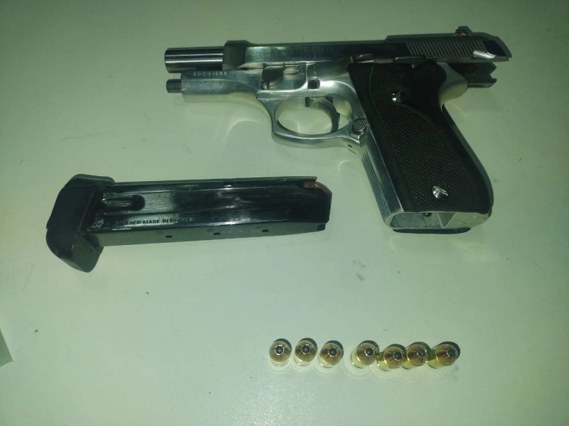 Arma e munições apreendidas pela PM