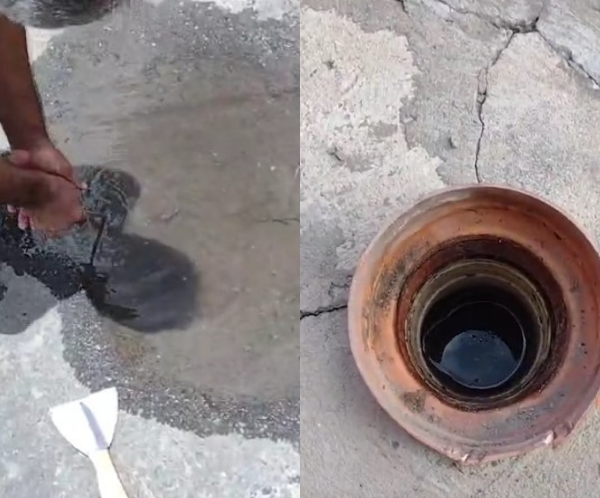 Caixa de esgoto obstruída