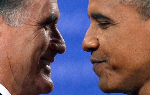 O republicano Mitt Romney e o democrata Barack Obama cumprimentam-se antes do debate desta segunda-feira (22) em Boca Raton, na Flórida(Imagem:AFP) O republicano Mitt Romney e o democrata Barack Obama cumprimentam-se antes do debate desta segunda-feira (22) em Boca Raton, na Flórida(Imagem:AFP)